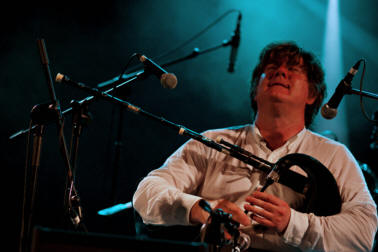 Photo of Fred Morrison playing the pipes
